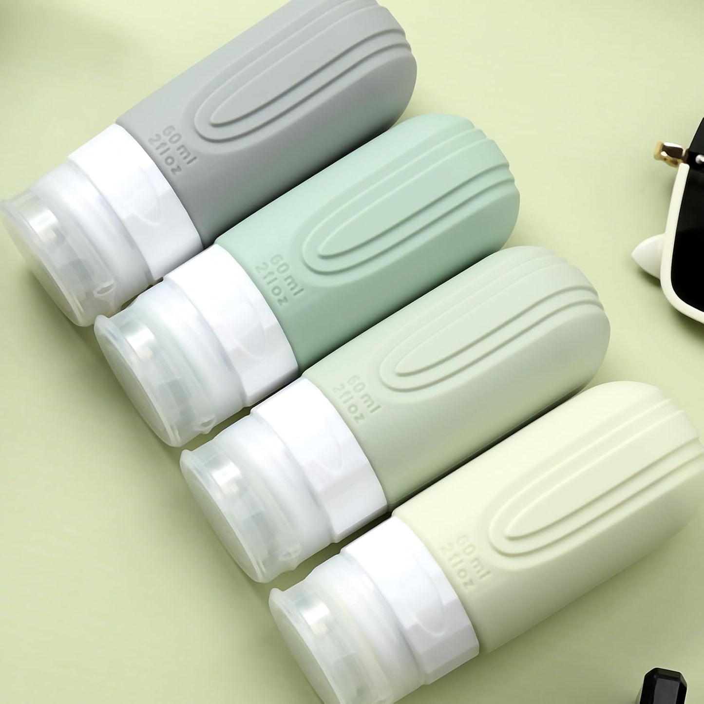 Travel Bottles for Toiletries, Tsa Approved 2oz Travel size Bottles, BPA Free Leak Proof Travels Toiletry Containers, Traveler Accessories with Toiletry Bag for Shampoo Liquid (4 Pack)